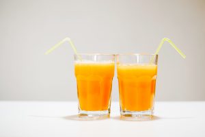 two glasses of orange juice