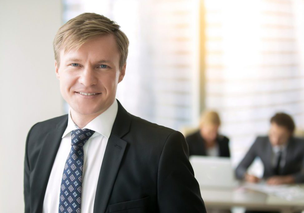 Portrait of a young smiling businessman