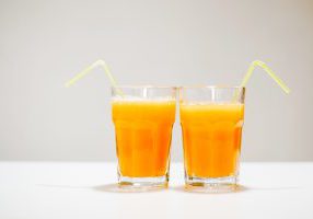 two glasses of orange juice