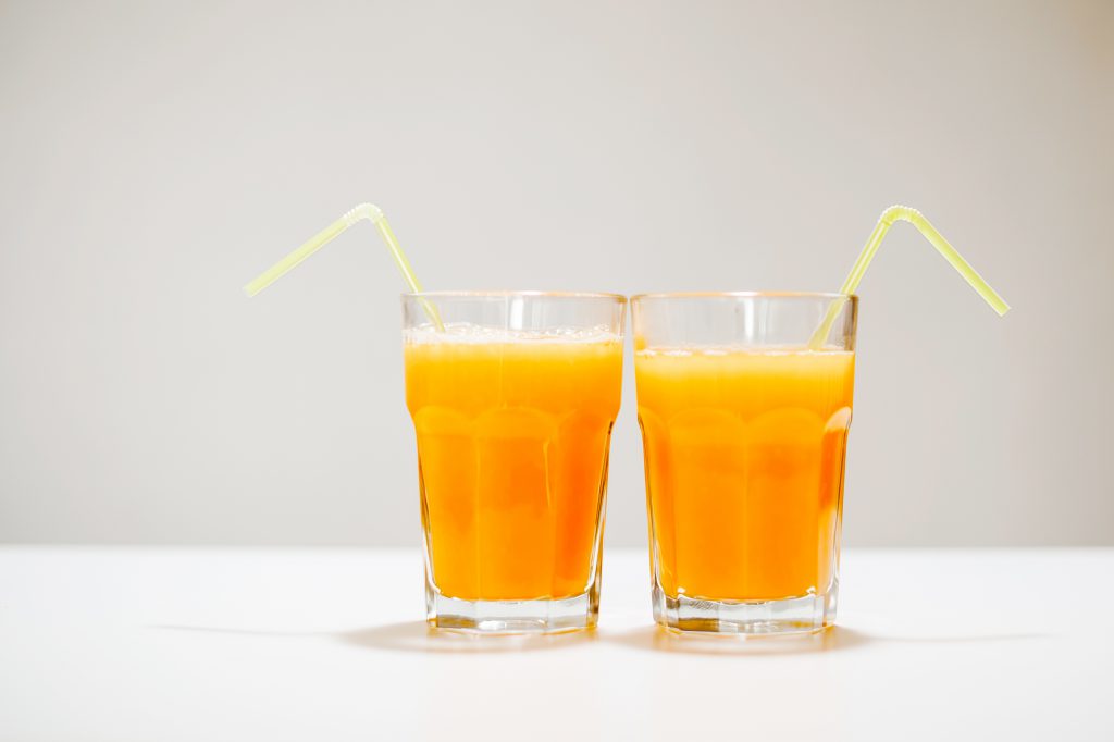 two glasses of orange juice